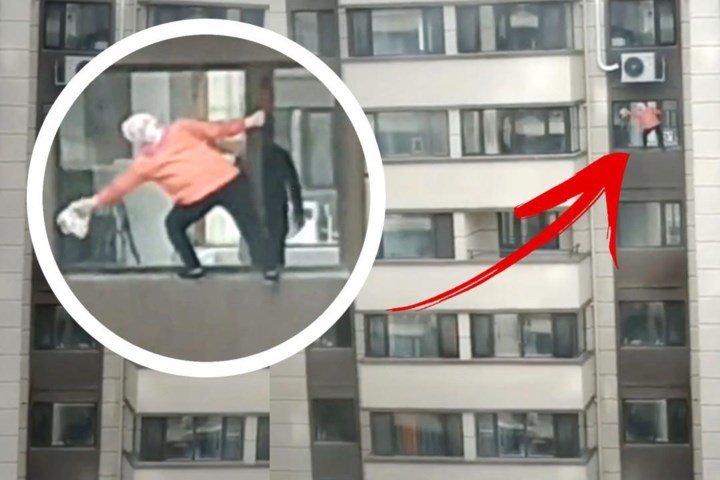 Vrouw riskeert haar leven op 30 meter hoogte voor… propere ramen